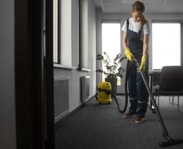 full-shot-woman-cleaning-indoors